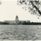 Image of the Legislative Building from afar, a lake is in front of it.
